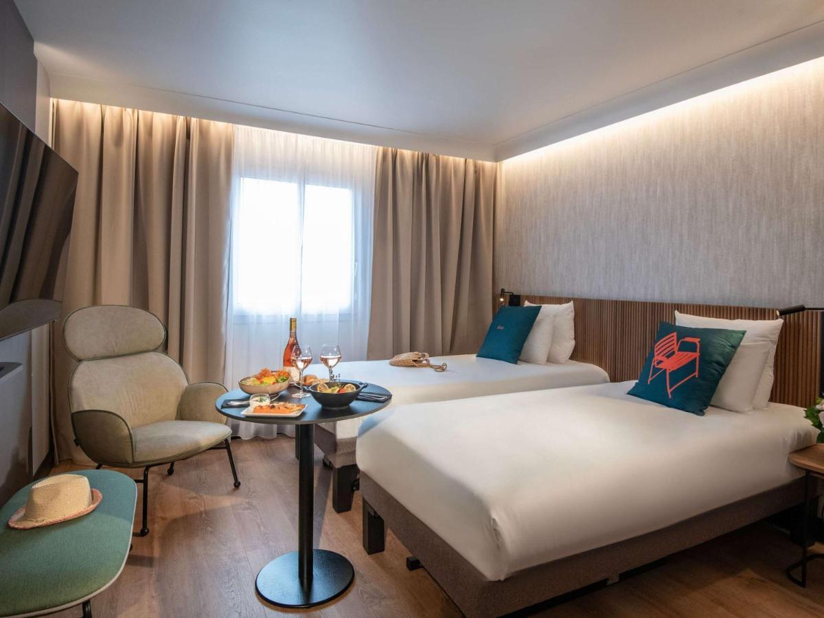 Novotel Arenas Aeroport 4*